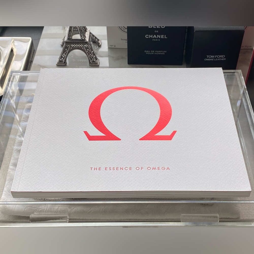 Omega Essence Book with Red Logo